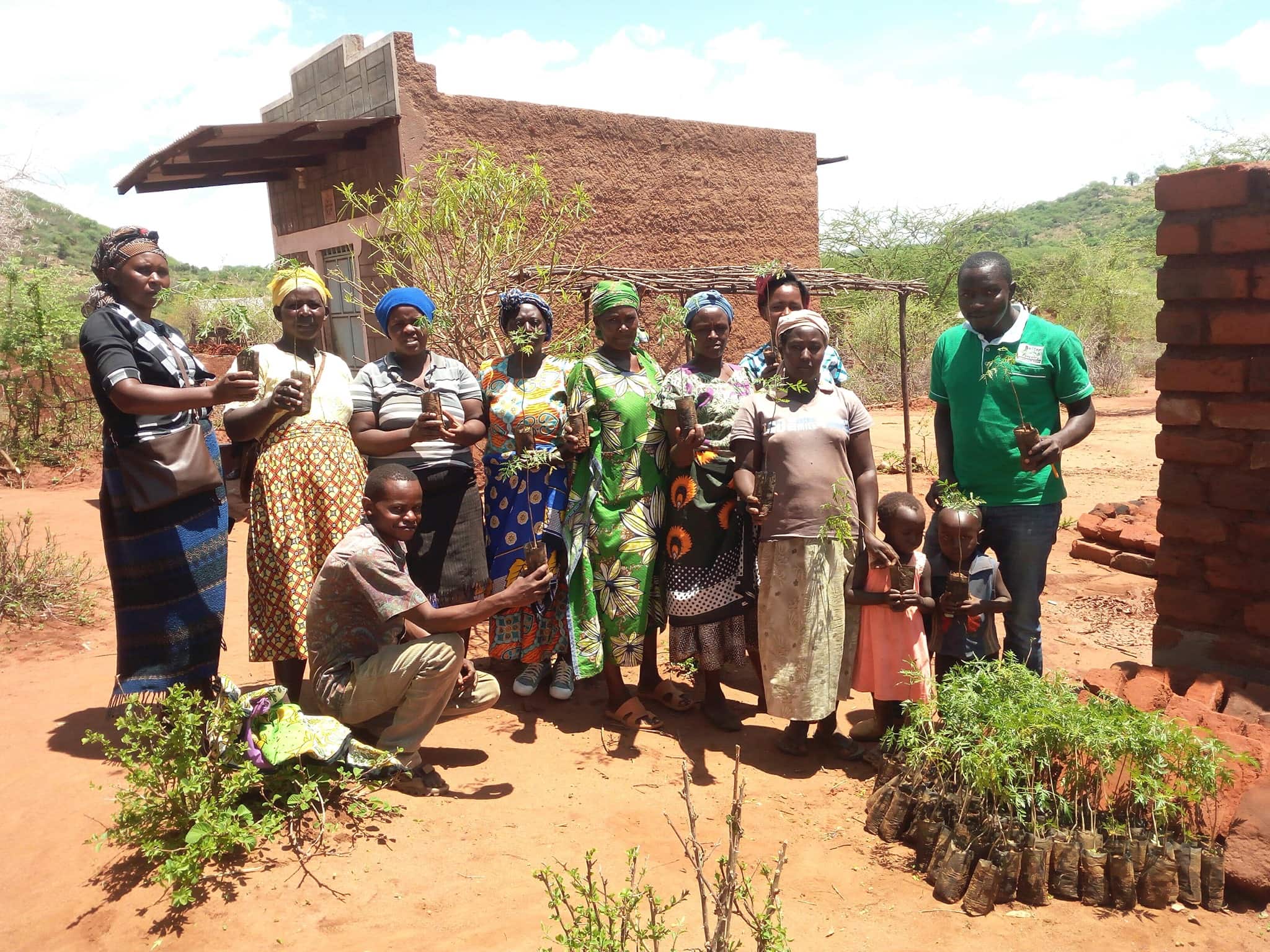 BGF partner farmers receiving Mukau tree seedlings for agroforestry implementation 